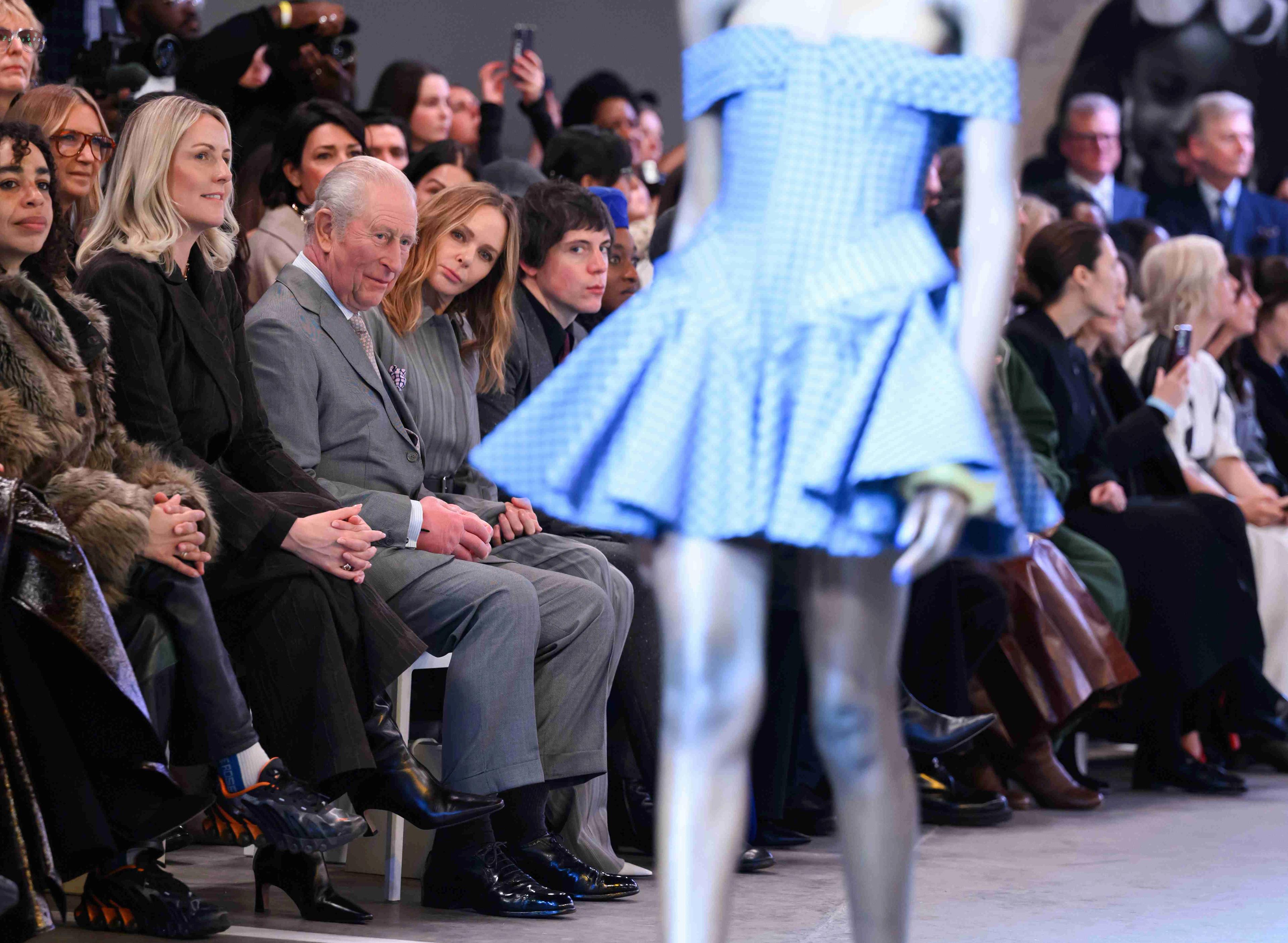 CEO of the British Fashion Council Laura Weir, King Charles III, Stella McCartney and Alexander McQueen creative director Sean Mcgirr attend the Tolu Coker show during London Fashion Week 2026.
