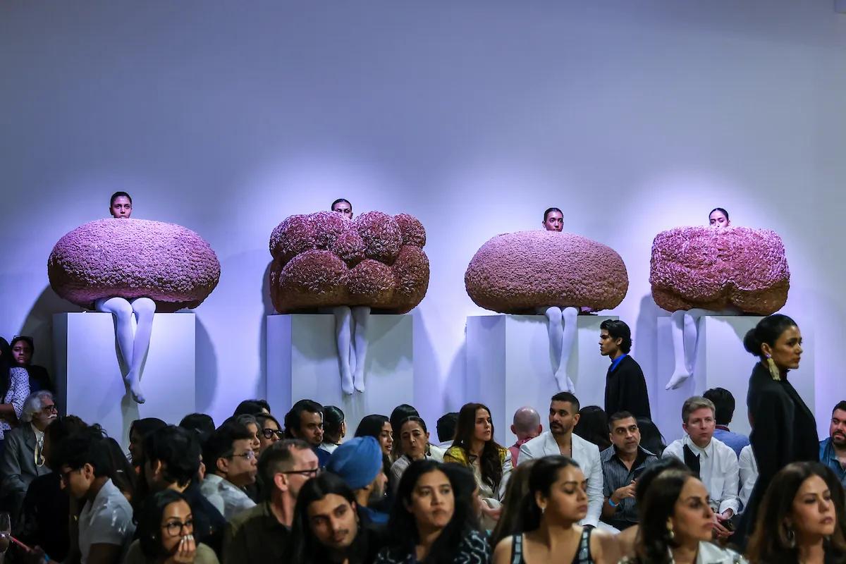 The front row at Khanna's LFW show, featuring Neha Dhupia and Angad Bedi, among others.