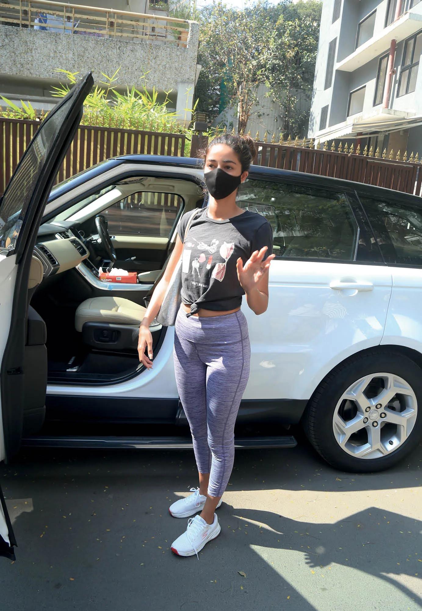 Ananya Panday stepping out of her Range Rover.