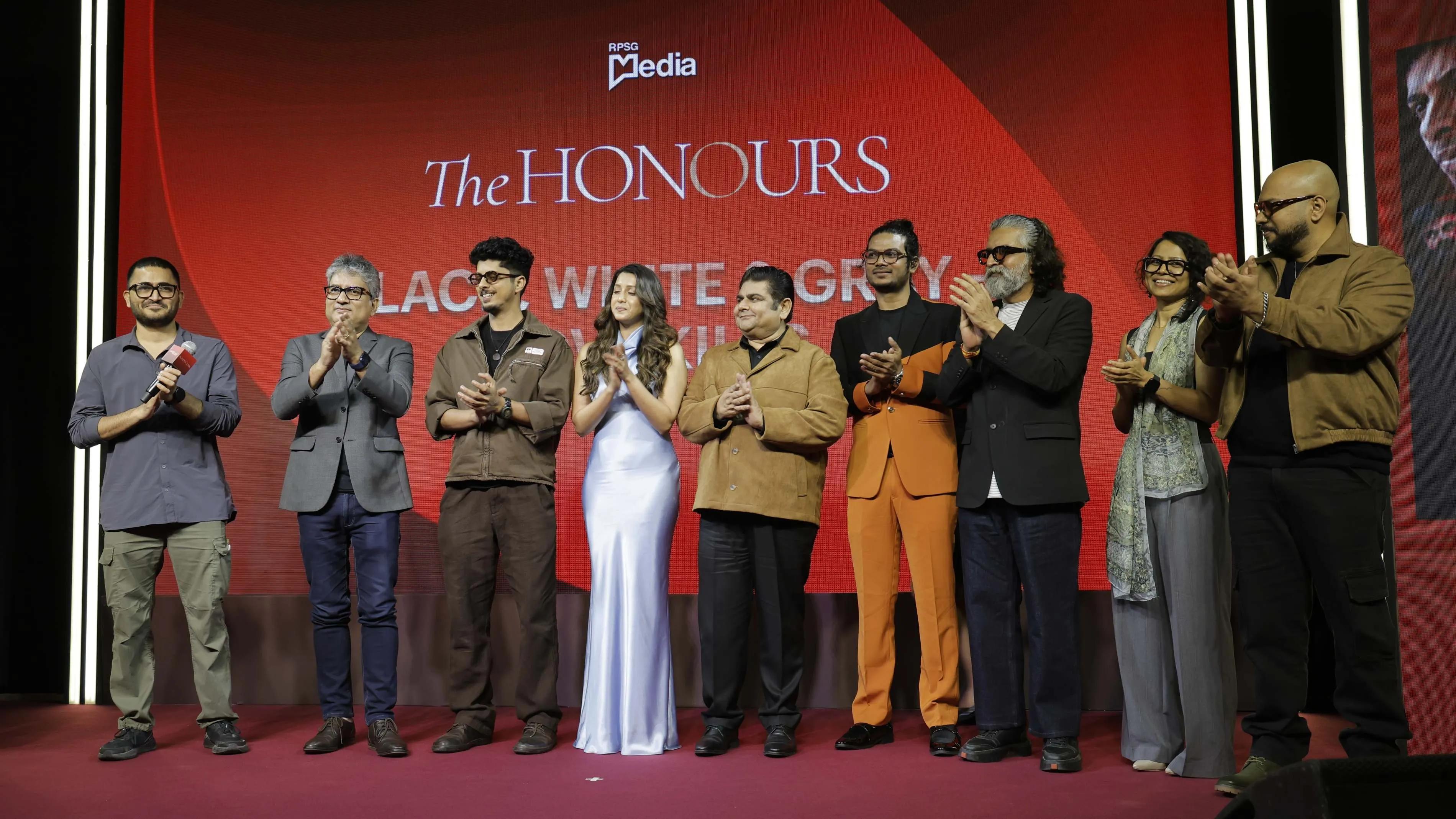 Imtiaz Ali presents The Honours award to team 'Black White & Gray - Love Kills' on stage