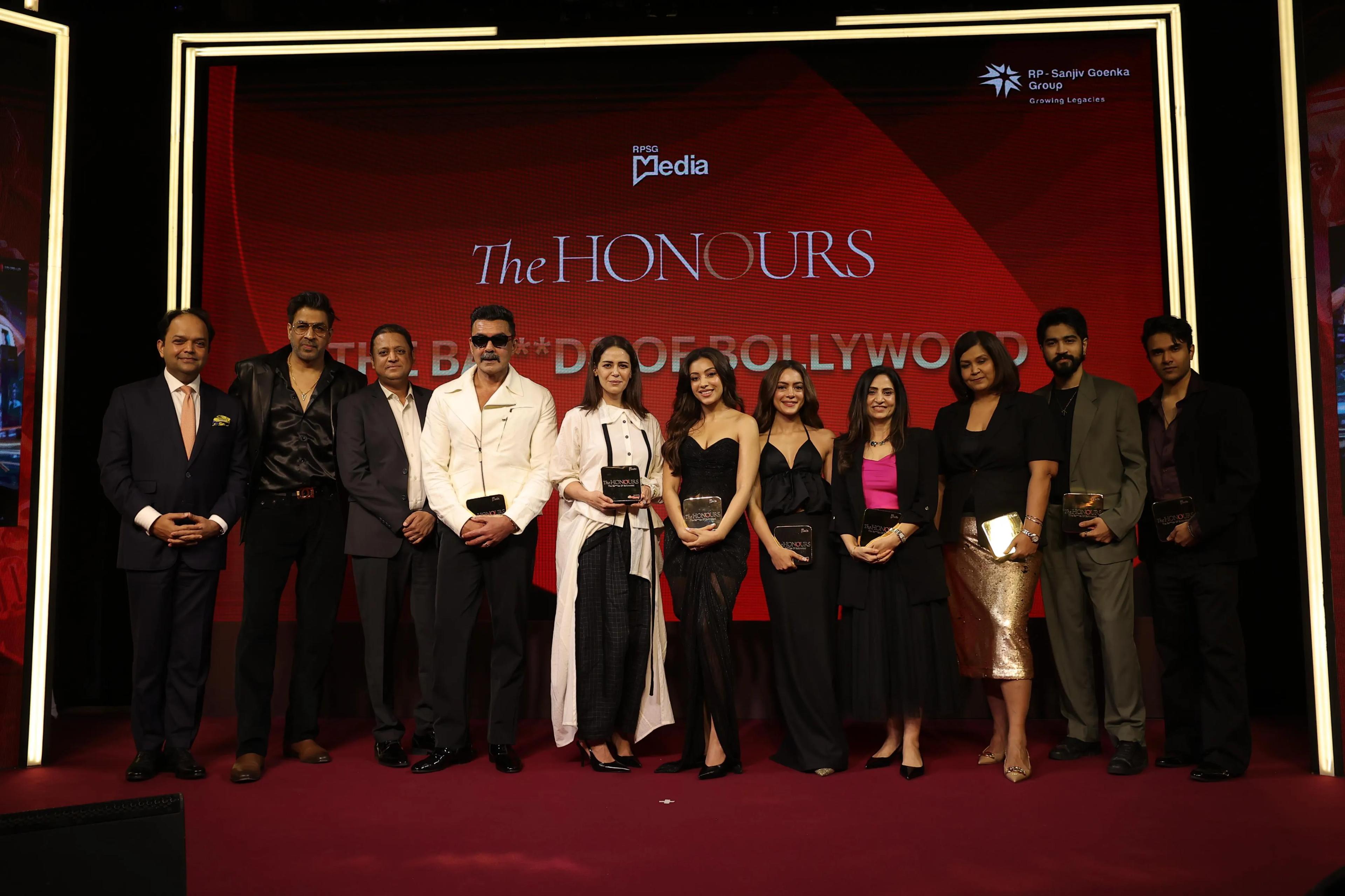 Imtiaz Ali presents The Honours award to team 'The Ba****ds of Bollywood' on stage