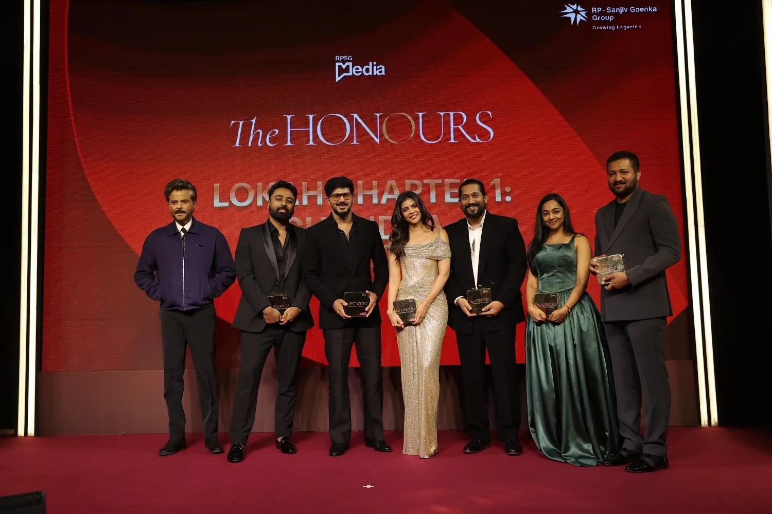 Anil Kapoor presents the award to team 'Lokah Chapter 1: Chandra' on stage